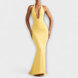 Vestido elegante com costas abertas e decote impressionante