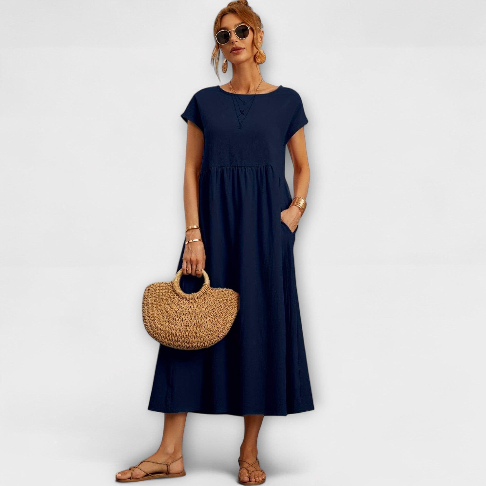 Vestido Midi de Linha Simples com Bolsos Laterais