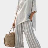 Conjunto Daisy com Blusa Assimétrica e Calças Listradas para Estilo Moderno e Elegante